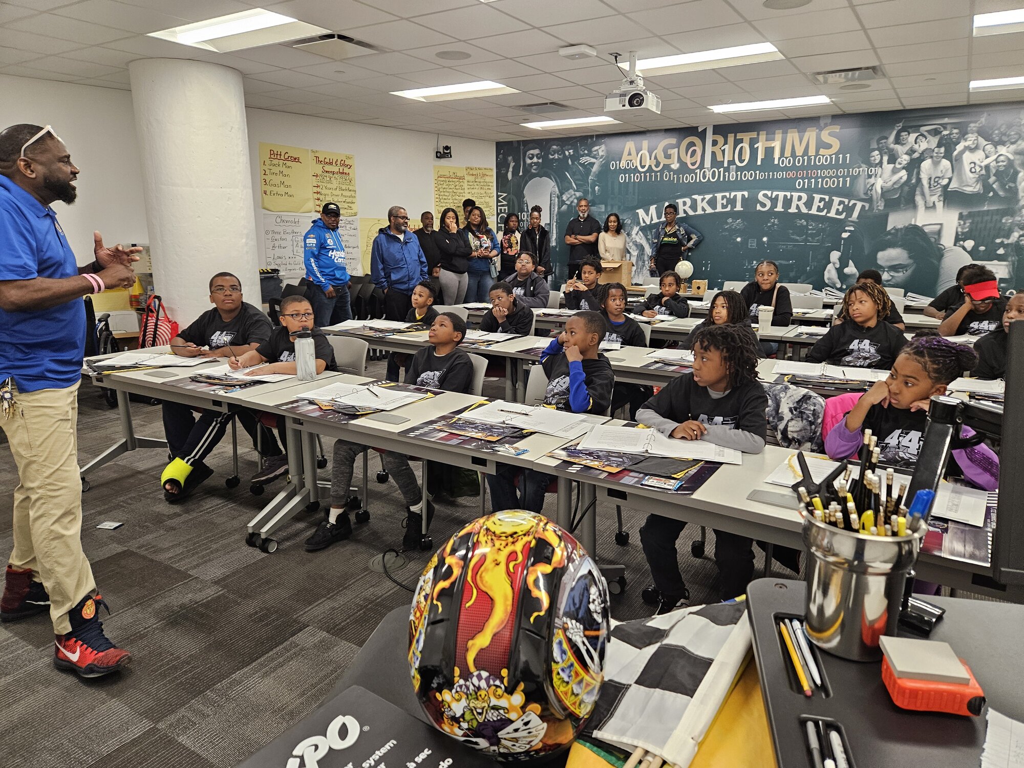 UYRS instructor leading a hands-on STEM class with students