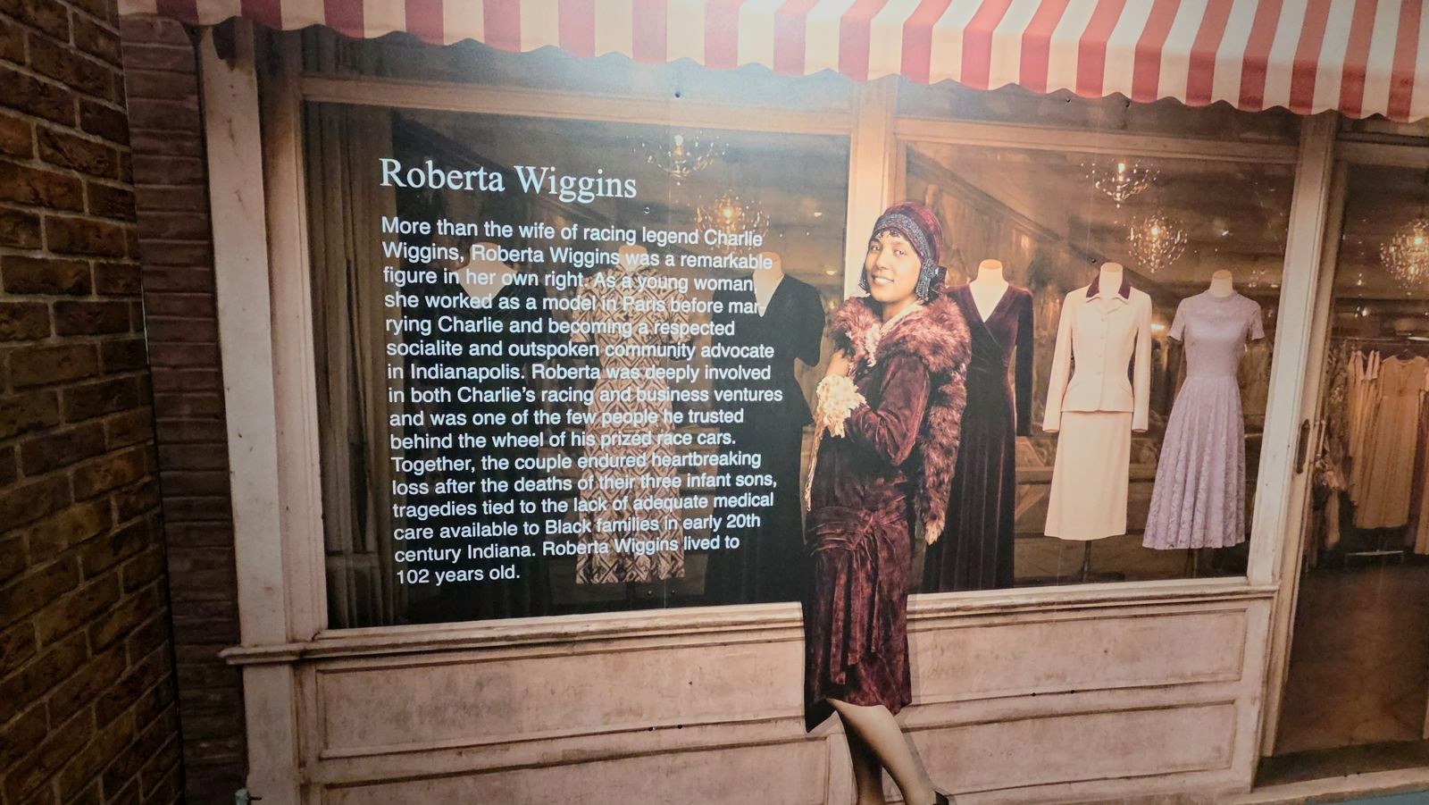 LeMay exhibit panel honoring Roberta Wiggins in a 1920s storefront window