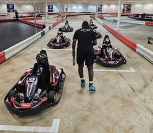 UYRS Instructor Ed Butler on the track with junior students